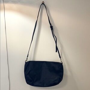 Sleek Black Crossbody Bag with Textured Fabric
